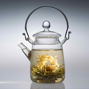 Teaposy lady fairy blooming tea in the tea for one glass teapot